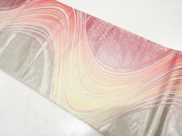 Bag belt with woven out flowing water pattern